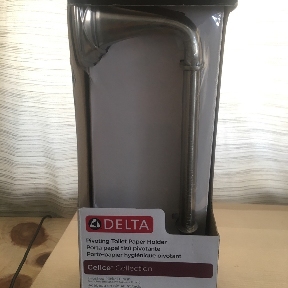 Delta Pivoting Toilet Paper Holder Brushed Nickel